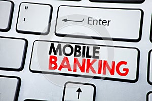 Writing text showing Mobile Banking. Business concept for Internet Banking e-bank written on white keyboard key with copy space. T