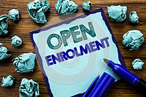 Writing text showing Open Enrolment. Business concept for Medicine Doctor Enroll Written on sticky note paper, wooden background w