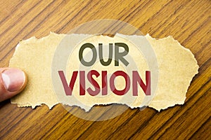 Writing text showing Our Vision. Business concept for Marketing Strategy Vision written on note paper on the wooden background wit