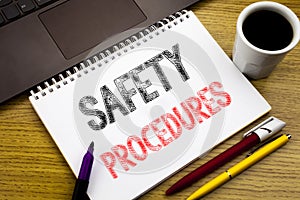 Writing text showing Safety Procedures. Business concept for Accident Risk Policy written on notebook book on the wooden backgroun