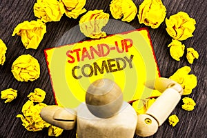 Writing text showing Stand Up Comedy. Business photo showcasing Entertainment Club Fun Show Comedian Night written on Sticky Note