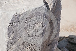 Writings on the ruins on Sacred Way in island of Delos, Greece