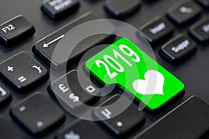 2019 written on a computer keyboard and a heart