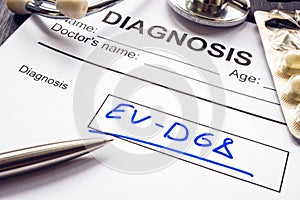 Written diagnosis Enterovirus D68 EV-D68 with pen and pills. photo