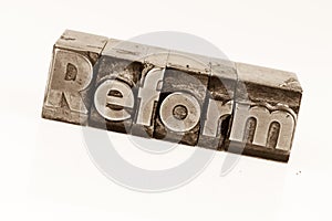 Written reform in lead letters photo