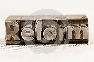 Written reform in lead letters photo