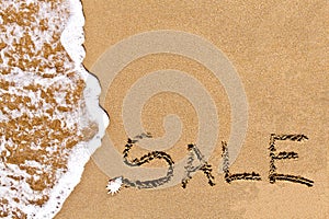 Written sale drawn on the sand