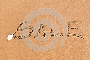 Written sale drawn on the sand