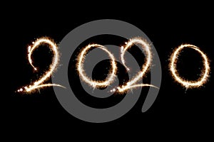 2020 written with Sparkle firework on black background, happy new year 2018 concept