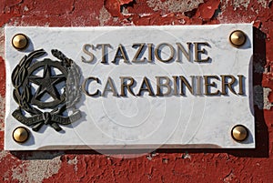 written STAZIONE CARABINIERI who in Italian means Italian police photo