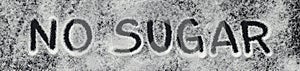 Written text NO SUGAR on black background