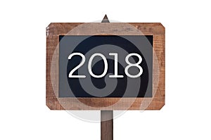2018 written on a vintage wooden postsign isolated on white background photo