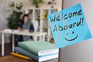 Written Welcome aboard and working new employee.