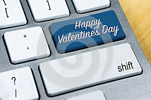 Written word Happy Valentine's Day on blue keyboard button