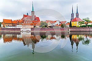 Wroclaw. Picturesque view of famous, old island Tumski with cathedral of St. John reflection in the Odra river.