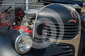 WROCLAW, POLAND - August 11, 2019: USA cars show: Dodge truck pickup 1941. Renovated black colour. Close up of engine and light