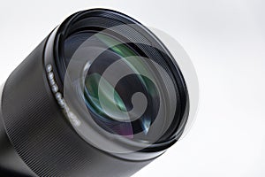 Wroclaw, Poland - December 19 2023: Camera lens for mirrorless Canon camera with RF mount Viltrox RF 85mm f1.8 STM on white