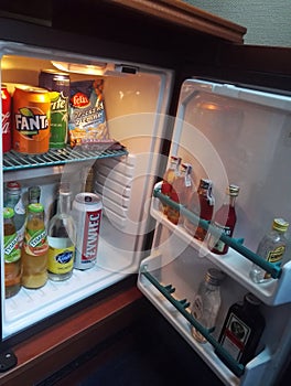 Wroclaw, Poland: Mini bar with soft drinks, vodka, wine, snacks and beer in the hotel room refrigerator. Room