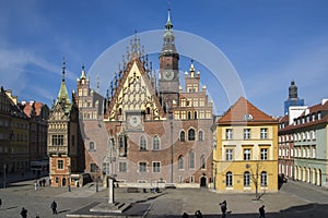 Wroclaw / POLAND - March 30, 2018: City hall with tower on main Wroclaw square, touristic season, sunny and blue sky