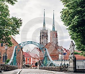 Wroclaw. Poland. View at Tumski island and Cathedral of St John the Baptist with bridge through river Odra