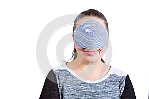 Wrong way to wear a mask. Ignoring quarantine. Girl with mask on eyes photo