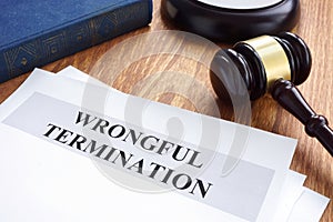 Wrongful termination. Documents and gavel