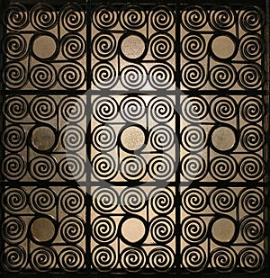 Wrought Greek iron gate grille made of spirals