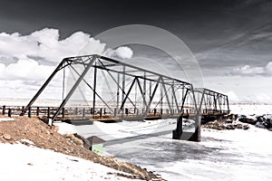 Wrought Iron Bridge spanning the Rio Grande. Built in 1892 - Costilla County, Colorado photo