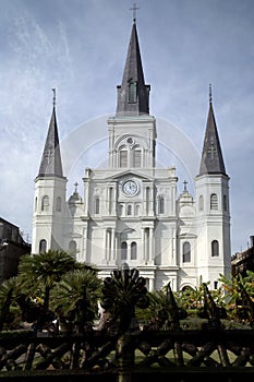 Wrought iron fence and Saint Louis Cathedral in New Orleans