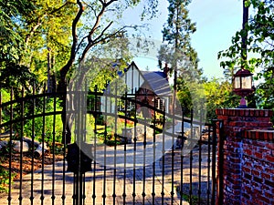 Wrought iron gate at an estate, Tudor style luxury