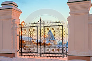 Wrought-iron gates, courtyard and fortress wall