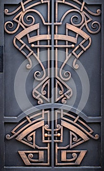 wrought-iron gates, ornamental forging, forged elements close-up