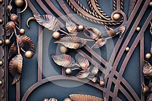 wrought-iron gates, ornamental forging, forged elements close-up