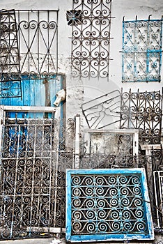 Wrought iron grilles against a wall