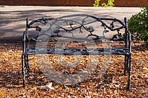 Wrought iron ornamental bench on Oakland Cemetery, Atlanta, USA