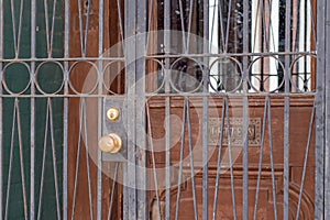 Wrought Iron Security Gate on Business in the Central Business District of New Orleans, LA, USA