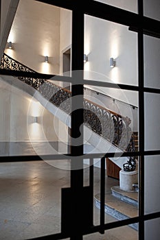 Wrought iron stair railing inside a French mansion