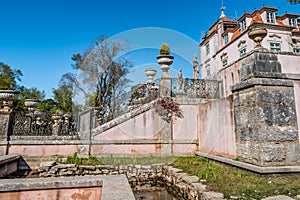 Wrought iron staircase wall and statues in the Marquis of Pombal Palace Garden, Oeiras PORTUGAL