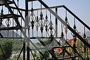 Wrought iron steps in mountain home with a view