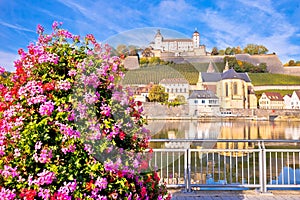 Wurzburg. Main river waterfront and scenic Wurzburg castle and vineyards reflection view