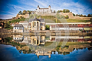 Wurzburg. Main river waterfront and scenic Wurzburg castle and vineyards reflection view