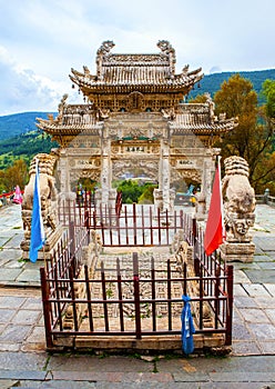Wutaishan(Mount Wutai) scene-Carved stone torii, lion and bridge in front of the Longquan temple door. photo