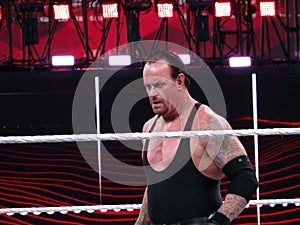 WWE Wrestler and legend the Undertaker stares across ring durin