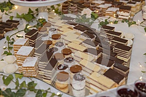 wWhite and brown cakes on sweet table