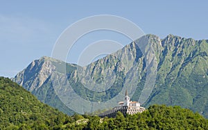 WWI memorial and church in Kobarid, Slovenia photo