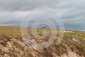 WWII blockhouse stands in the middle of the sand dunes of southwestern France