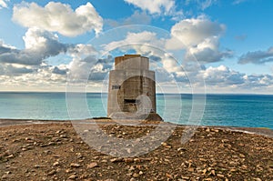 WWII concrete nazi naval tower on the seashore, Saint Quen, bailiwick of Jersey, Channel Islands photo