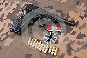 WWII era nazi german army 9 mm semi-automatic pistol with Iron Cross award