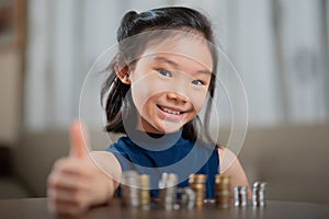 Asian girl, managing finances, counting money photo