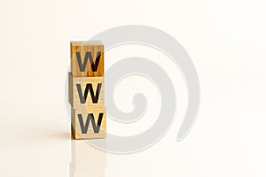 WWW text on wooden cubes on white background